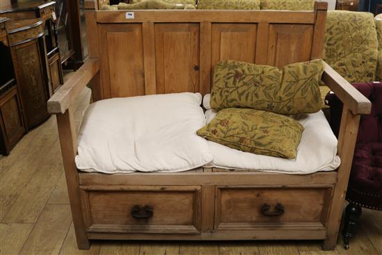 A pine settle with two drawer base, W.126cm